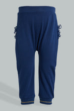 تنزيل الصورة على معرض الصور، Redtag-Navy-Frilled-Neck-Jogsuit-Colour:Navy,-Filter:Infant-Girls-(3-to-24-Mths),-Infant-Girls-Sets,-New-In,-New-In-ING,-Non-Sale,-Section:Kidswear,-W21B-Infant-Girls-3 to 24 Months
