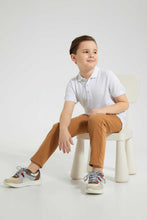 تنزيل الصورة على معرض الصور، Redtag-White-Pique-Polo-Plain-Boys-2 to 8 Years