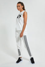 تنزيل الصورة على معرض الصور، Redtag-White-Sleeveless-Boxy-T-Shirt-With-Placement-Print-Active-Tees-Women's-0