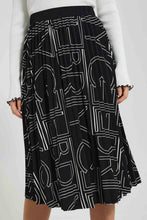Load image into Gallery viewer, Redtag-Black-Printed-Pleated-Skirt-Celebrity-Skirts,-Colour:Black,-Filter:Women's-Clothing,-New-In,-New-In-LDC,-Non-Sale,-S22A,-Section:Women-Women's-