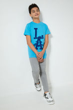 تنزيل الصورة على معرض الصور، Redtag-Blue-La-T-Shirt-Graphic-Prints-Senior-Boys-9 to 14 Years