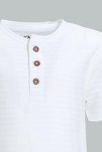 تنزيل الصورة على معرض الصور، Redtag-White-Jacquard-Short-Sleeve-T-Shirt-Colour:White,-Filter:Infant-Boys-(3-to-24-Mths),-Infant-Boys-T-Shirts,-New-In,-New-In-INB,-Non-Sale,-S22B,-Section:Kidswear,-TBL-Infant-Boys-3 to 24 Months