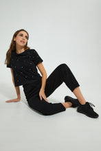 تنزيل الصورة على معرض الصور، Redtag-Black-Shortsleeve-Crop-Top-With-Studs-All-Over-Graphic-Prints-Women's-