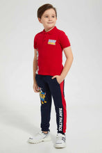 تنزيل الصورة على معرض الصور، بنطلون رياضي باللون الكحلي بطبعة شخصية كرتونية