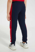 تنزيل الصورة على معرض الصور، بنطلون رياضي باللون الكحلي بطبعة شخصية كرتونية