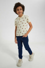 تنزيل الصورة على معرض الصور، Redtag-Beige-Lion-Printed-Polo-Polo-Shirts-Boys-2 to 8 Years