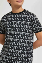 تنزيل الصورة على معرض الصور، Redtag-Black-Aop-Jacquard-T-Shirt-All-Over-Prints-T-Shirts-Senior-Boys-9 to 14 Years