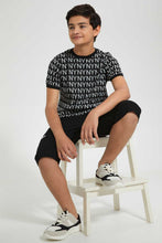 تنزيل الصورة على معرض الصور، Redtag-Black-Aop-Jacquard-T-Shirt-All-Over-Prints-T-Shirts-Senior-Boys-9 to 14 Years