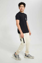 تنزيل الصورة على معرض الصور، Redtag-Black-Patch-Pocket-&-Print-At-The-Back-Tee-Graphic-T-Shirts-Senior-Boys-9 to 14 Years
