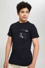 تنزيل الصورة على معرض الصور، Redtag-Black-Patch-Pocket-&-Print-At-The-Back-Tee-Graphic-T-Shirts-Senior-Boys-9 to 14 Years