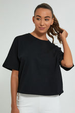 تنزيل الصورة على معرض الصور، بلوزة رياضية باللون الأسود