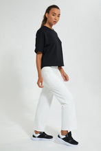 تنزيل الصورة على معرض الصور، بلوزة رياضية باللون الأسود