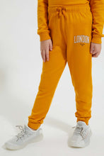 Load image into Gallery viewer, Redtag-Mustard-Paris-Print-Track-Colour:Mustard,-Filter:Girls-(2-to-8-Yrs),-Girls-Joggers,-New-In,-New-In-GIR,-Non-Sale,-Section:Kidswear,-TBL,-W21B-Girls-2 to 8 Years
