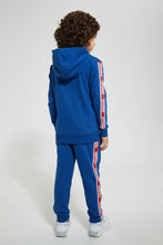 تنزيل الصورة على معرض الصور، Redtag-Blue-Superman-Hooded-Jogsuit-Jog-Sets-Boys-2 to 8 Years
