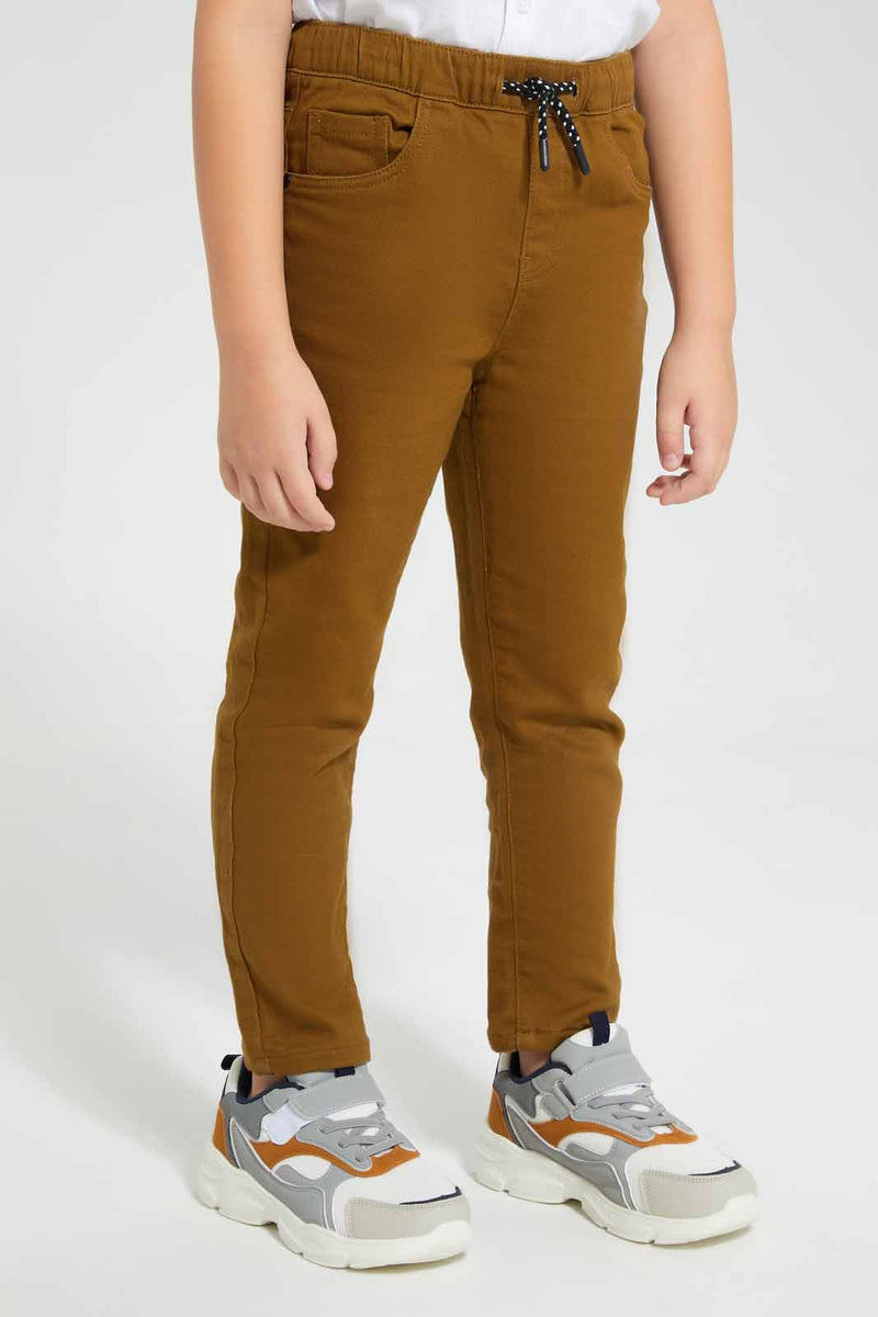 Redtag-Tan-Brown-Elasticated-Knit-Denim-Jean-BOY-Jeans,-Category:Jeans,-Colour:Tan,-Deals:Sale,-Filter:Boys-(2-to-8-Yrs),-S22A,-Sale,-Sale-BOY-APL,-Section:Kidswear--