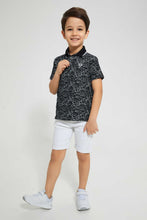 تنزيل الصورة على معرض الصور، Redtag-Black-Splat-Print-Short-Sleeve-Polo-Shirt-Polo-Shirts-Boys-2 to 8 Years
