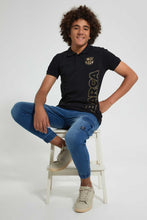 تنزيل الصورة على معرض الصور، Redtag-Black-Barca-Polo-Polo-Shirts-Senior-Boys-9 to 14 Years
