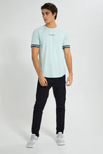 تنزيل الصورة على معرض الصور، Redtag-Green-Stretch-T-Shirt-With-Cuff-Tape-Graphic-Prints-Men&#39;s-
