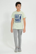 Load image into Gallery viewer, Redtag-Green-Street-Style-Skate-T-Shirt-Graphic-Prints-Senior-Boys-9 to 14 Years
