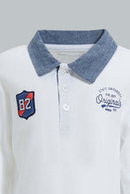 تنزيل الصورة على معرض الصور، Redtag-White-Chambrey-Color-Long-Sleeve-Polo-Shirts-Polo-Shirts-Infant-Boys-3 to 24 Months
