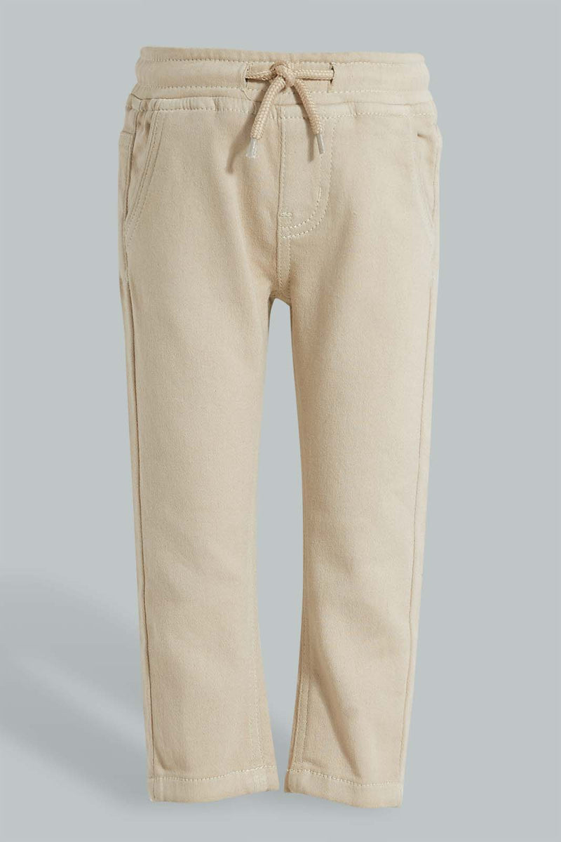 Redtag-Beige-Color-Knit-Denim-Pant-Character,-Colour:Beige,-Filter:Infant-Boys-(3-to-24-Mths),-Infant-Boys-Jeans,-New-In,-New-In-INB,-Non-Sale,-S22B,-Section:Kidswear,-TBL-Infant-Boys-3 to 24 Months