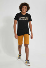 Load image into Gallery viewer, Redtag-Black-Emboss-With-Foil-Print-T-Shirt-All-Over-Prints-Senior-Boys-9 to 14 Years
