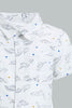 Redtag-White-Dino-Printed-Short-Sleeve-Shirt-Colour:White,-Filter:Infant-Boys-(3-to-24-Mths),-Infant-Boys-Shirts,-New-In,-New-In-INB,-Non-Sale,-S22B,-Section:Kidswear,-TBL-Infant-Boys-3 to 24 Months