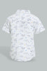 Redtag-White-Dino-Printed-Short-Sleeve-Shirt-Colour:White,-Filter:Infant-Boys-(3-to-24-Mths),-Infant-Boys-Shirts,-New-In,-New-In-INB,-Non-Sale,-S22B,-Section:Kidswear,-TBL-Infant-Boys-3 to 24 Months