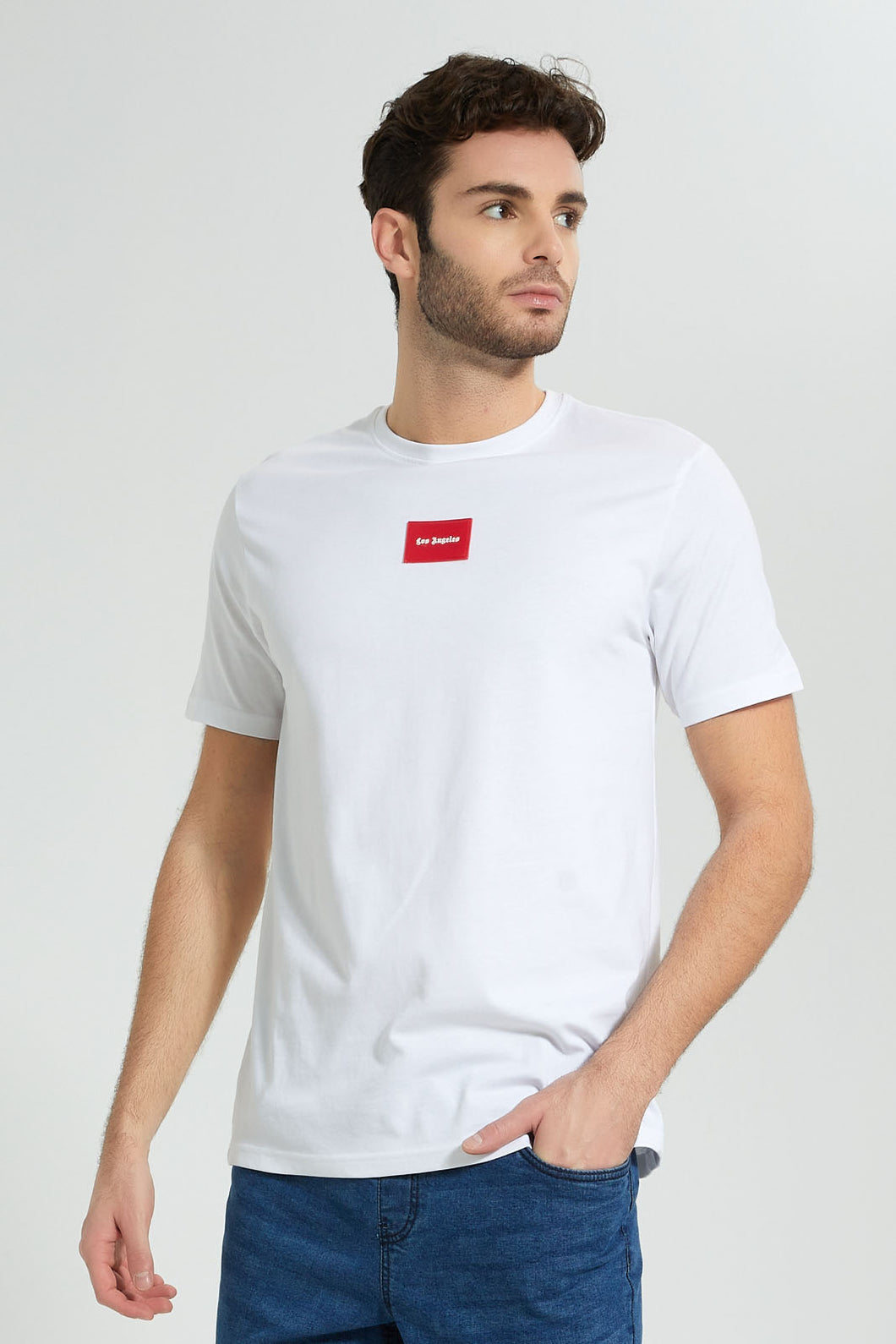 Redtag-White-T-Shirt-With-Rubber-Patch-Colour:White,-Filter:Men's-Clothing,-Men-T-Shirts,-New-In,-New-In-Men,-Non-Sale,-S22B,-Section:Men-Men's-