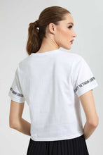 تنزيل الصورة على معرض الصور، Redtag-White--T-Shirt-With-Artwork-Cropped-Tops-Women&#39;s-
