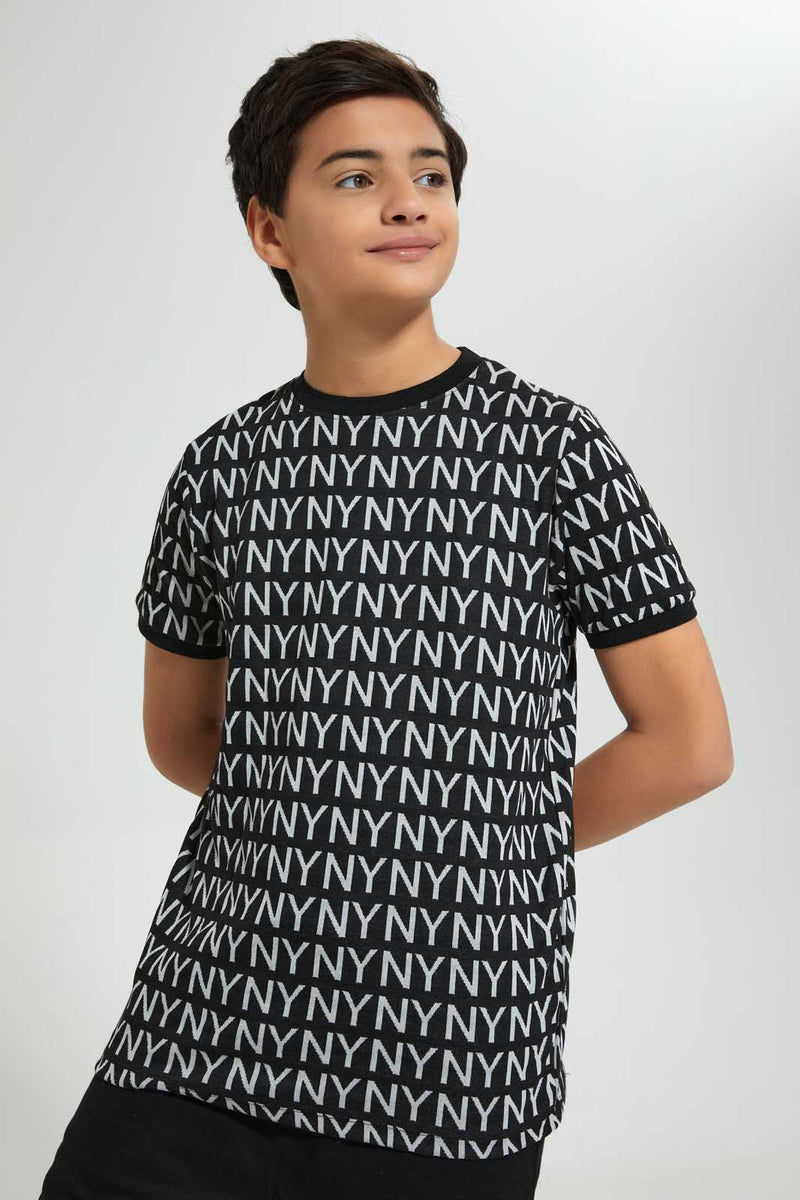 Redtag-Black-Aop-Jacquard-T-Shirt-All-Over-Prints-T-Shirts-Senior-Boys-9 to 14 Years