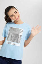 Load image into Gallery viewer, Redtag-Lt-Blue-Drop-Shoulder-Foil-Print-Top-Graphic-Prints-Senior-Girls-9 to 14 Years
