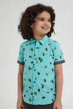 تنزيل الصورة على معرض الصور، Redtag-Light-Blue-Dino-Aop-Short-Sleeve-Shirt-Casual-Shirts-Boys-2 to 8 Years
