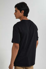 تنزيل الصورة على معرض الصور، Redtag-Black-Oversize-T-Shirt-With-Pu-Pocket-Graphic-Prints-Men&#39;s-
