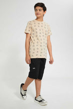 تنزيل الصورة على معرض الصور، Redtag-Beige-Allover-Print-T-Shirt-Graphic-T-Shirts-Senior-Boys-9 to 14 Years
